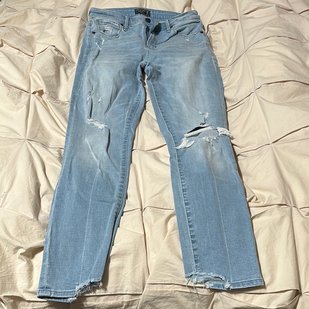 Distressed Light Blue Denim Jeans